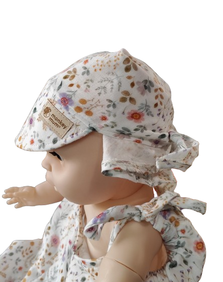 Batic din muselină cu cozoroc Monkey Mum® - Pajiște înflorită